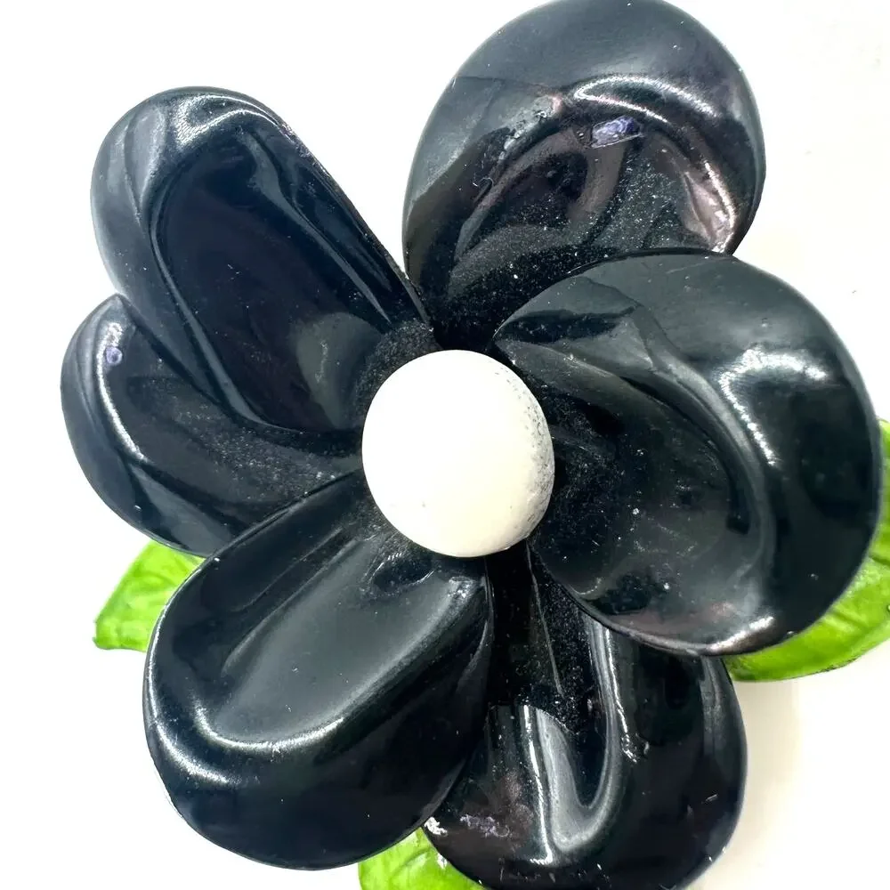 Vintage 1960s black white green enamel gold tone metal flower flower brooch